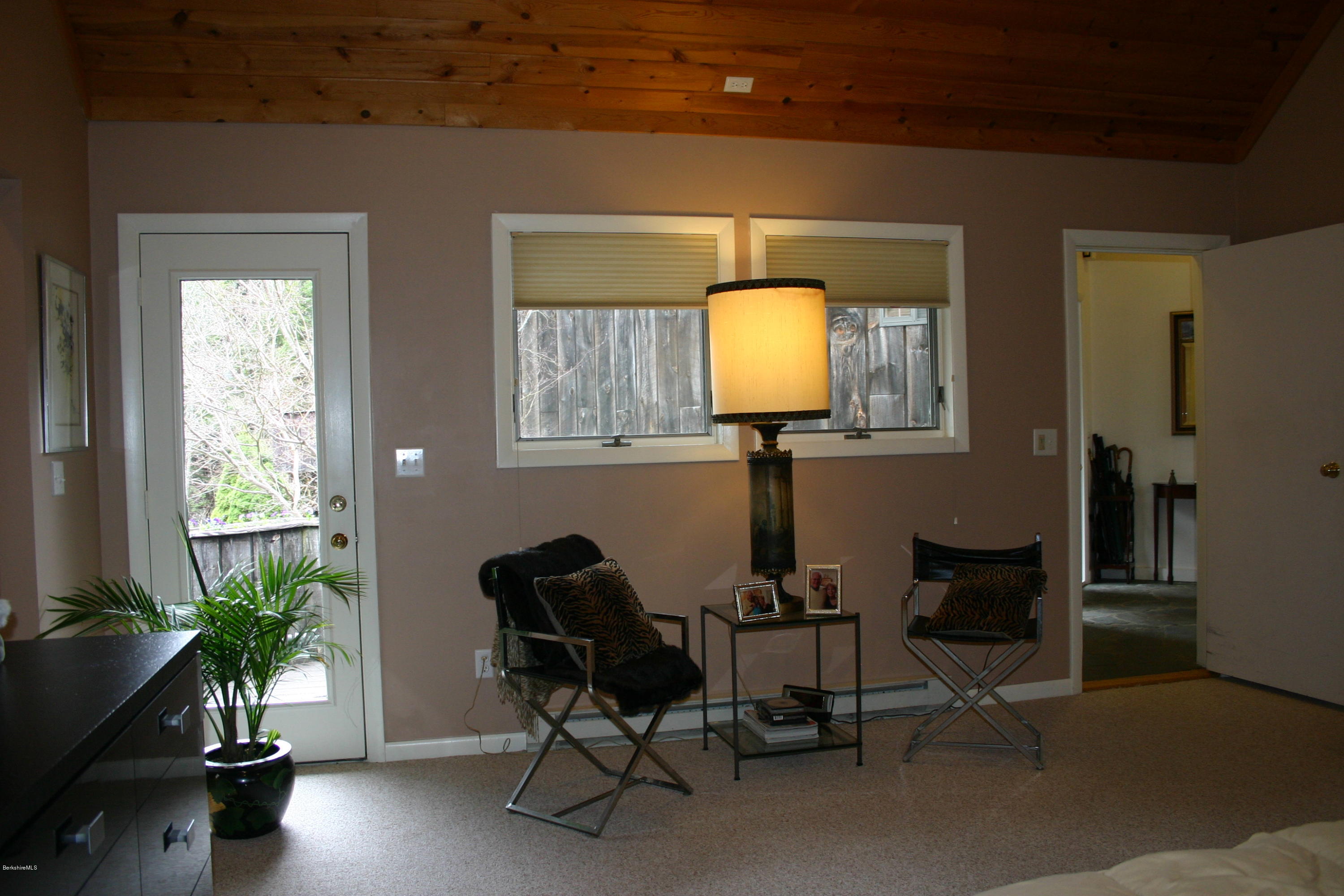 660 Main Road Monterey, MA 01245 - Photo 22 of 25 a view of a workspace with furniture and a window
