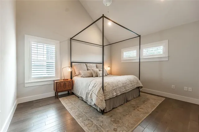 a bathroom with a sink toilet and a mirror