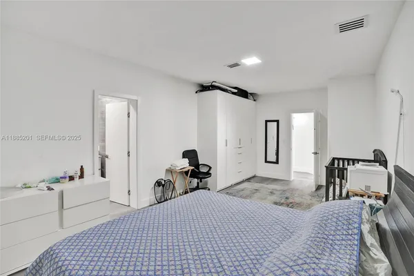 a bathroom with a sink a mirror and a shower