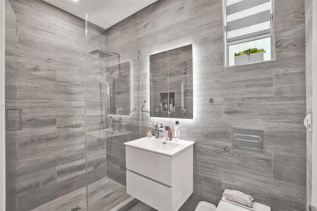 a view of a roof deck with furniture