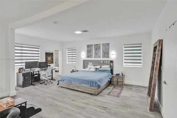 a living room with furniture and window