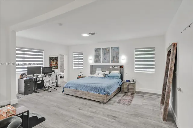 a living room with furniture and window