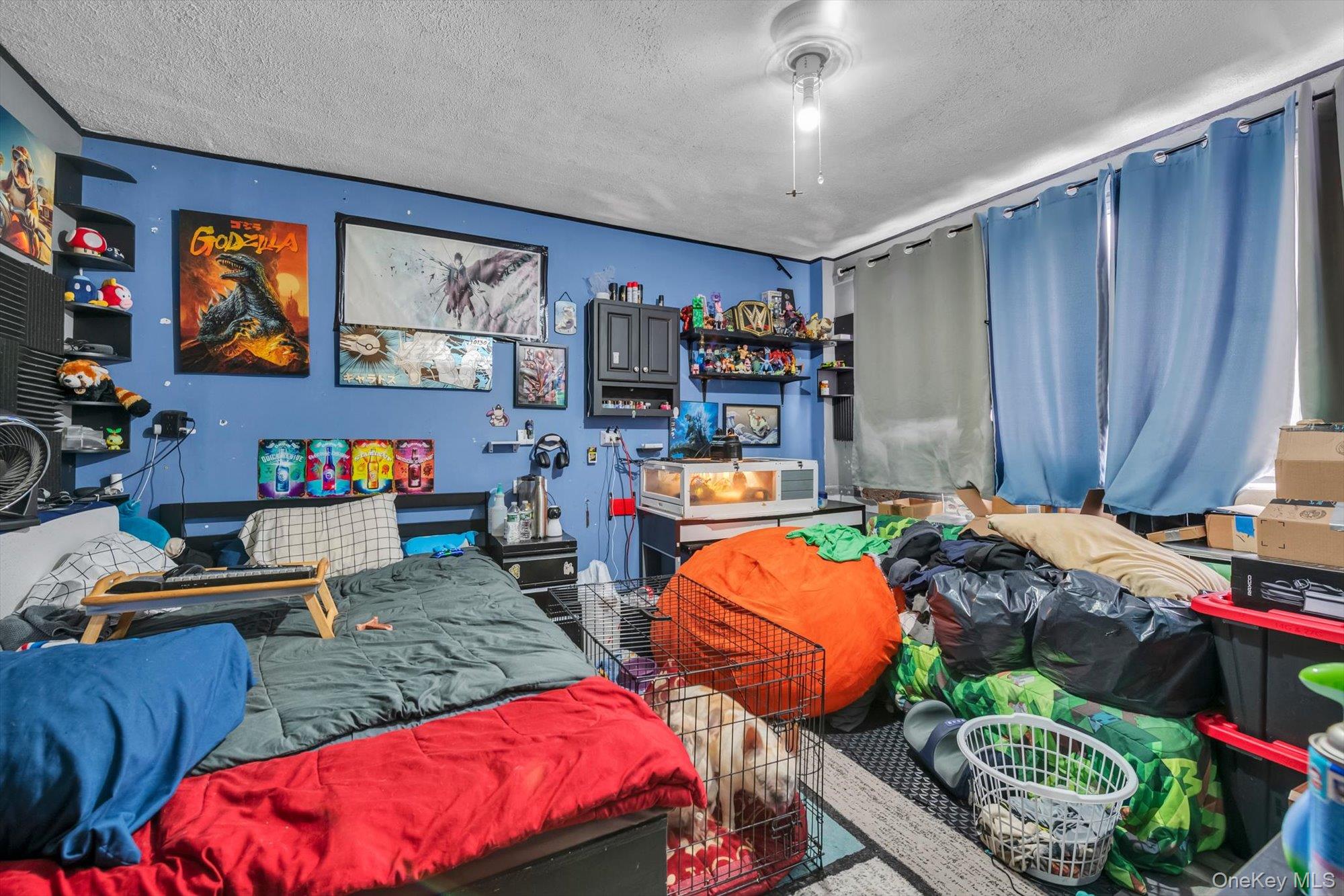 88-35 75th Street Queens, NY 11421 - Photo 6 of 11 a living room with furniture and a wooden floor