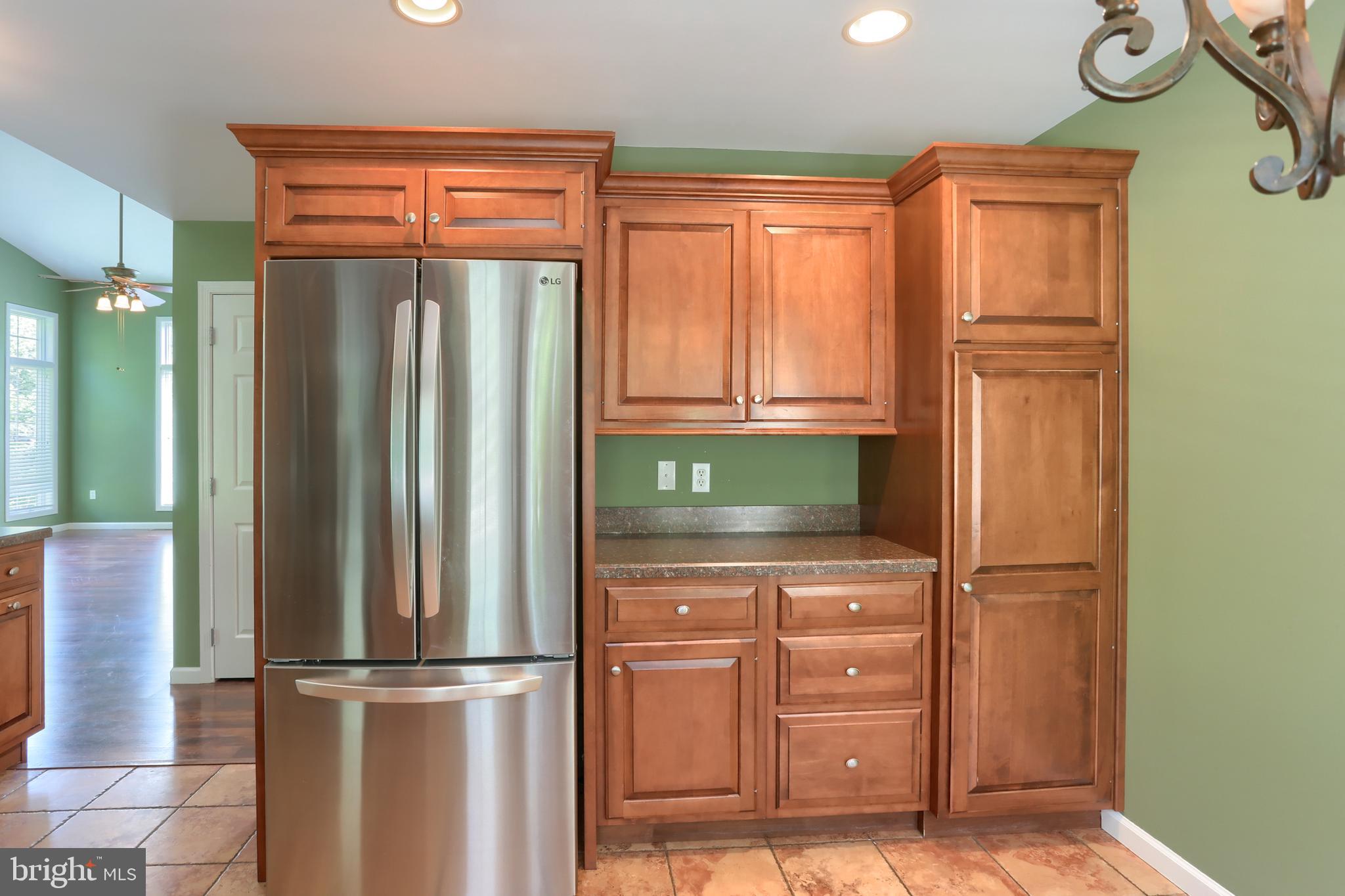 112 Crooked Hill Road Hummelstown, PA 17036 - Photo 19 of 51 a kitchen with a refrigerator and cabinets