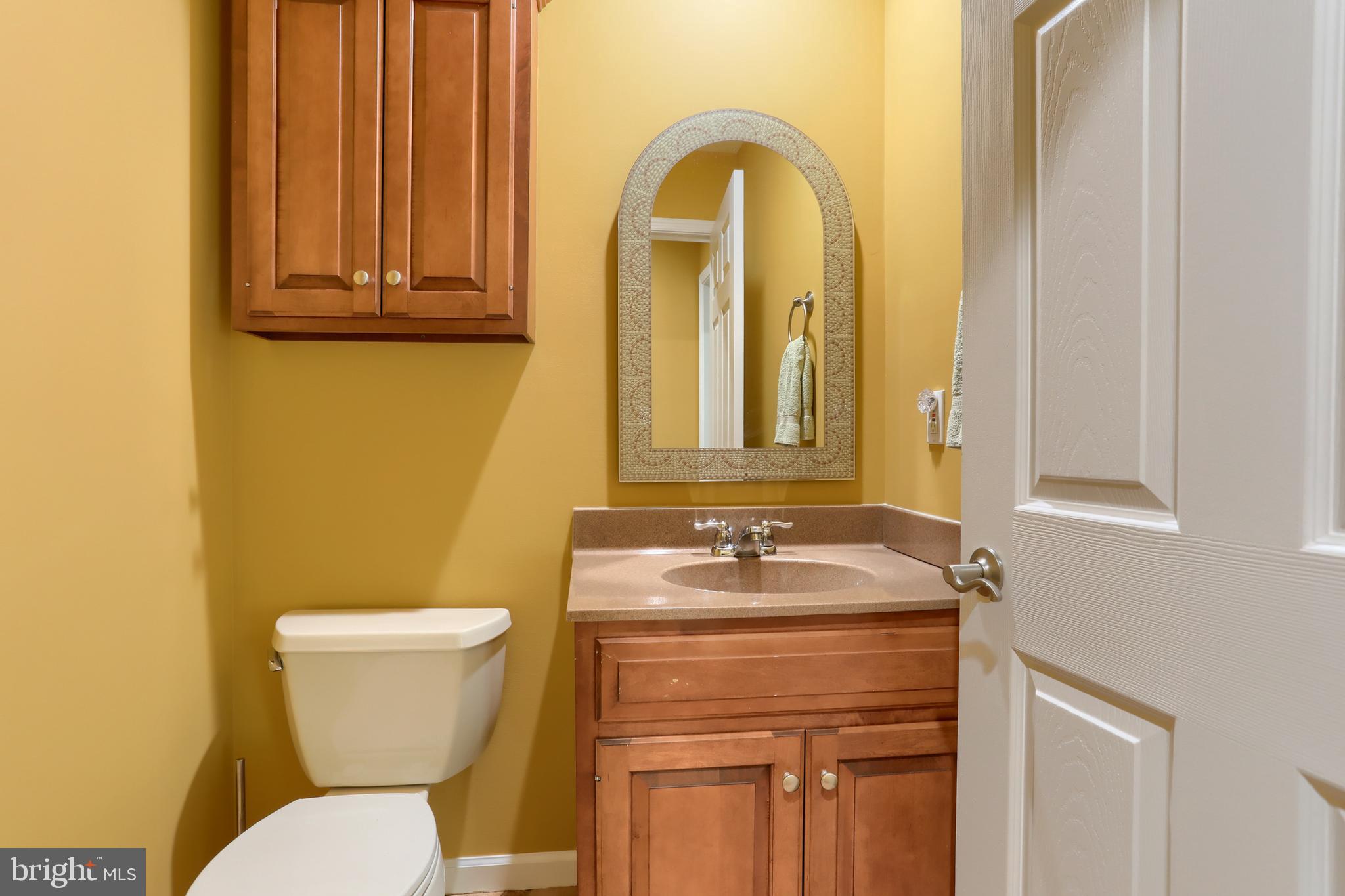 112 Crooked Hill Road Hummelstown, PA 17036 - Photo 20 of 51 a bathroom with a granite countertop toilet and sink