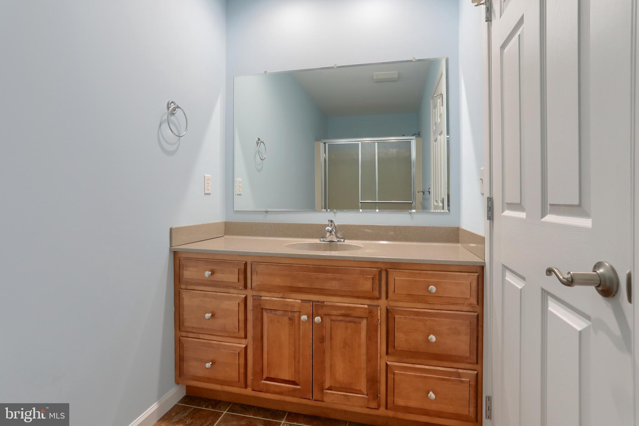 112 Crooked Hill Road Hummelstown, PA 17036 - Photo 28 of 51 a bathroom with a granite countertop sink and a mirror
