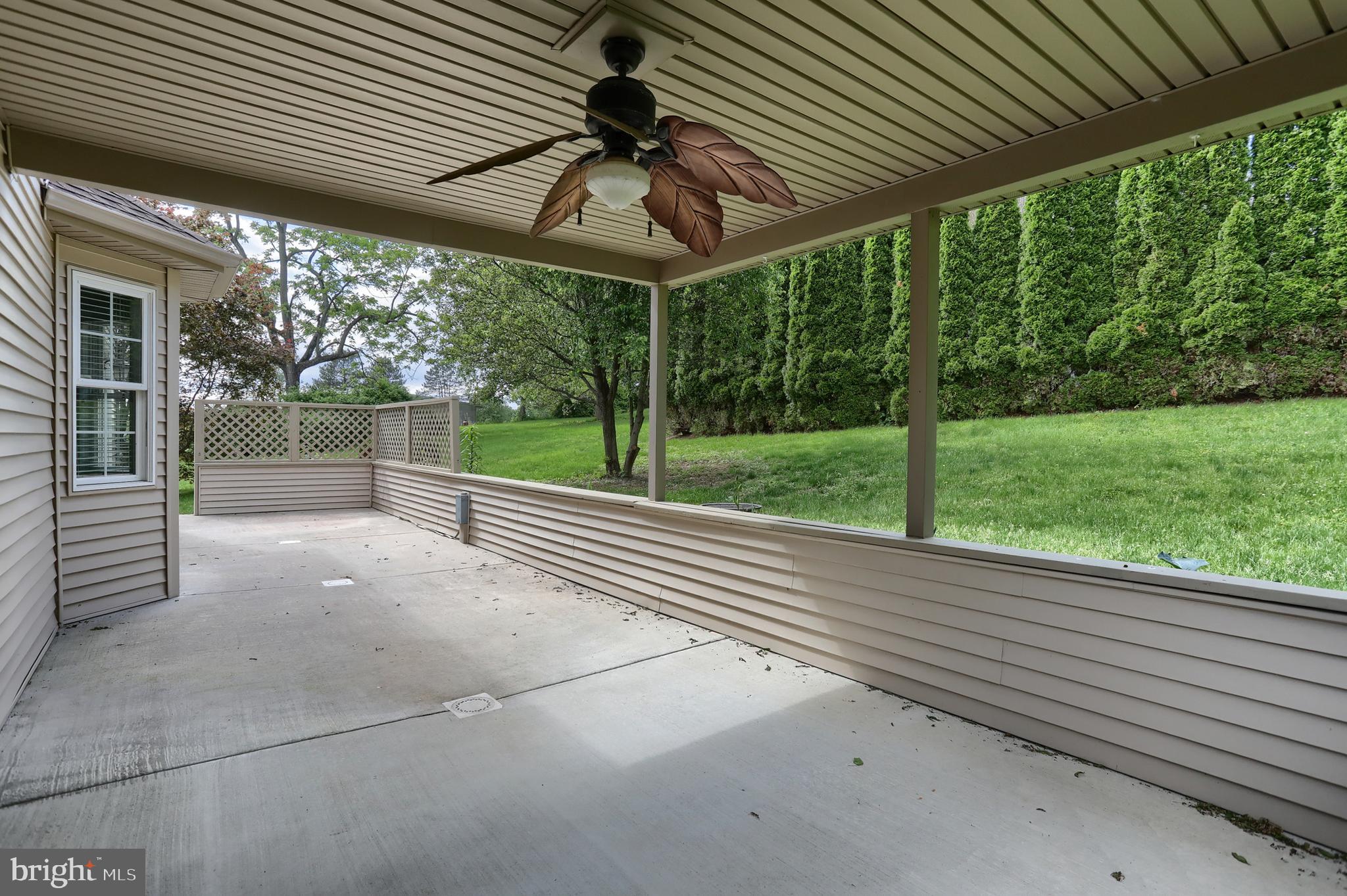 112 Crooked Hill Road Hummelstown, PA 17036 - Photo 45 of 51 a view of a backyard with floor to ceiling window and tree