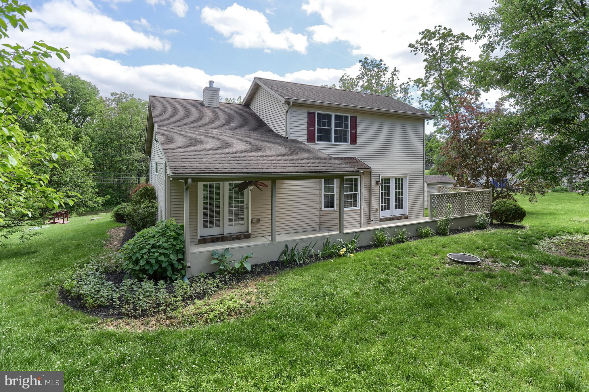 112 Crooked Hill Road Hummelstown, PA 17036 - Photo 46 of 51 a view of a house with a yard and plants