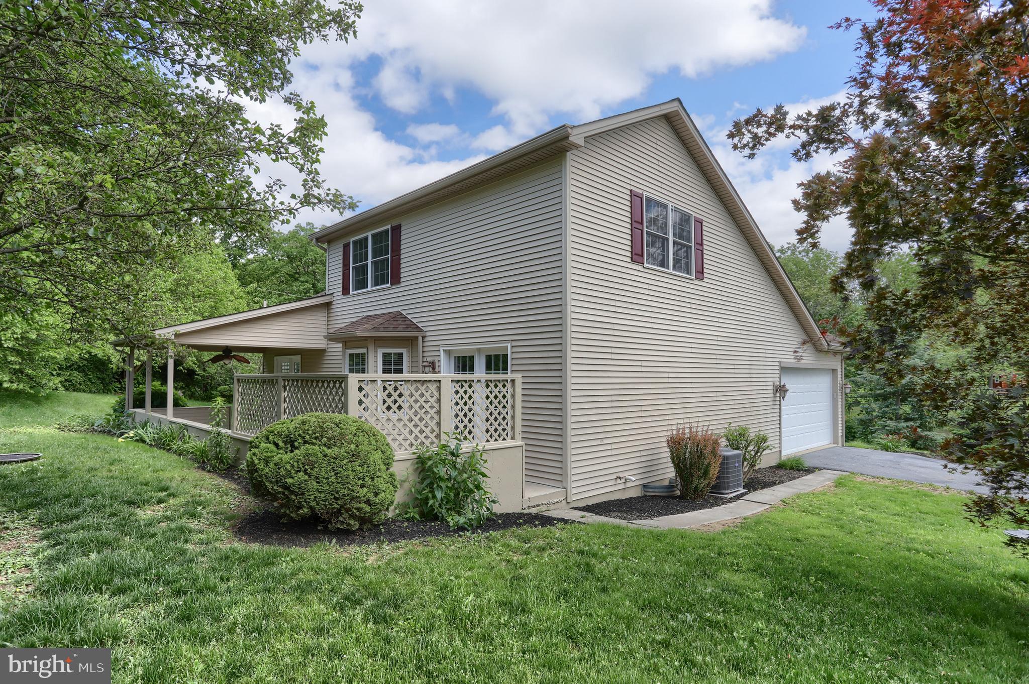 112 Crooked Hill Road Hummelstown, PA 17036 - Photo 49 of 51 a front view of a house with a garden