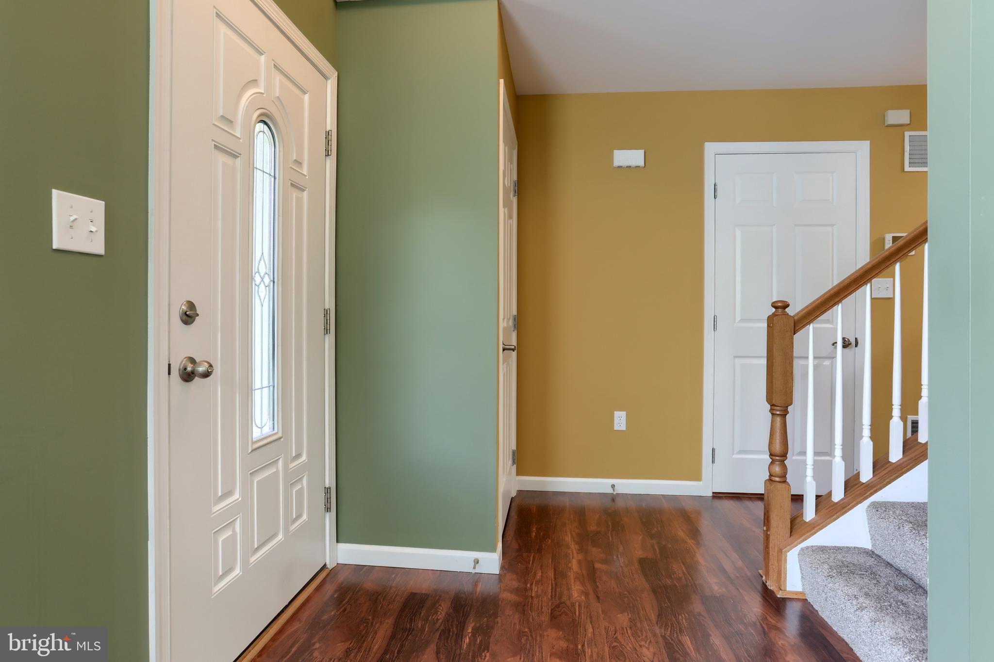 112 Crooked Hill Road Hummelstown, PA 17036 - Photo 5 of 51 a view of a hallway with wooden floor and front door