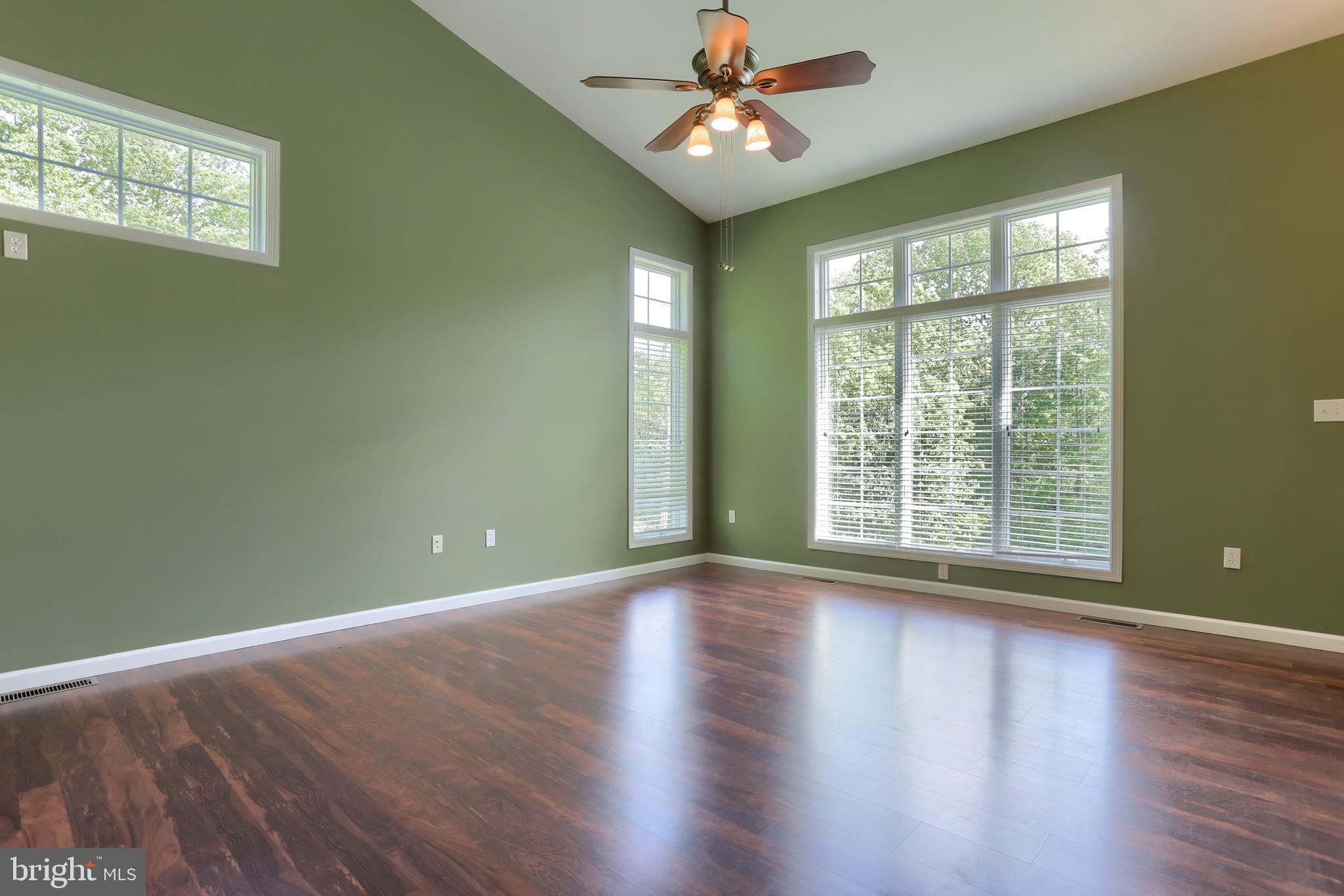 112 Crooked Hill Road Hummelstown, PA 17036 - Photo 7 of 51 a view of room with window ceiling fan and hardwood floor