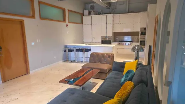 a living room with furniture and a couch