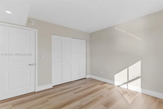 a view of a balcony next to a lake view