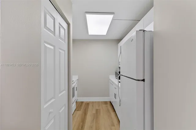 a kitchen with a stove and a microwave