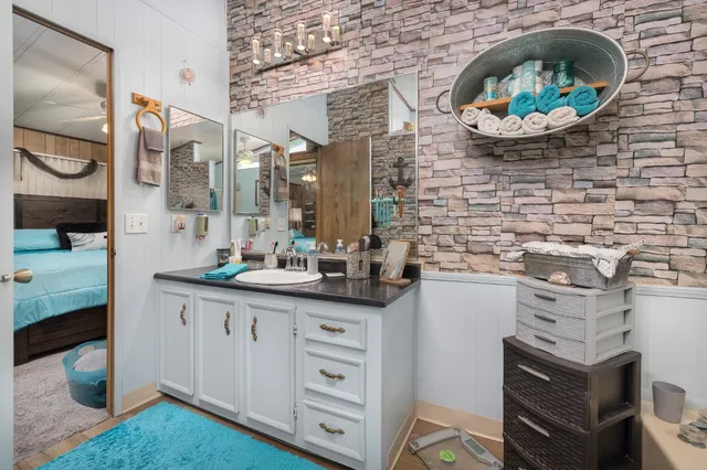 a white bath tub sitting in a bathroom