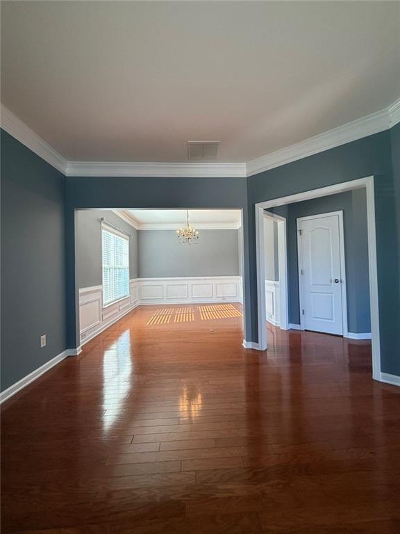 1009 South Creek Drive Villa Rica, GA 30180 - Photo 14 of 61 a view of empty room with wooden floor