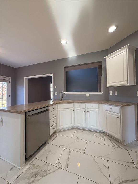 1009 South Creek Drive Villa Rica, GA 30180 - Photo 23 of 61 a kitchen with stainless steel appliances granite countertop a stove a sink and a microwave