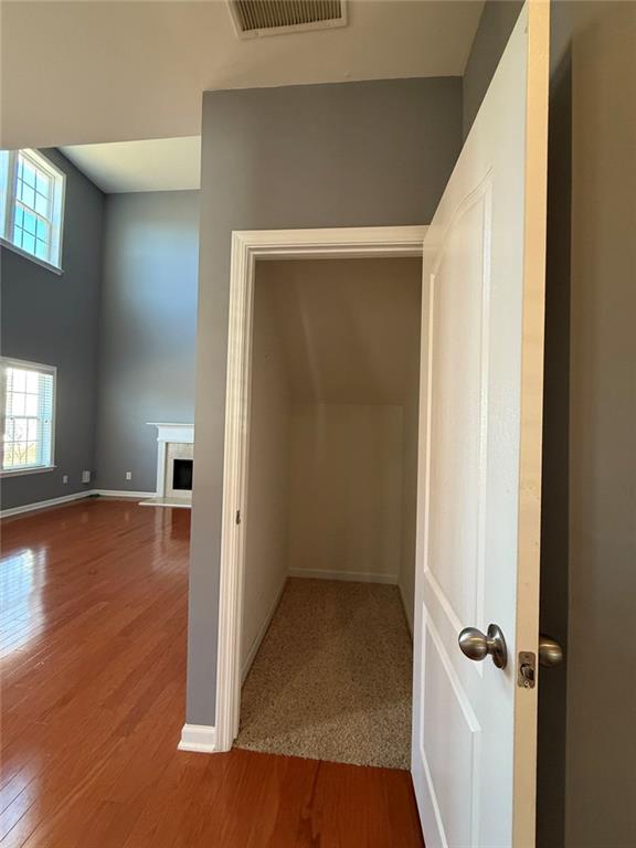 1009 South Creek Drive Villa Rica, GA 30180 - Photo 30 of 61 an empty room with wooden floor and windows