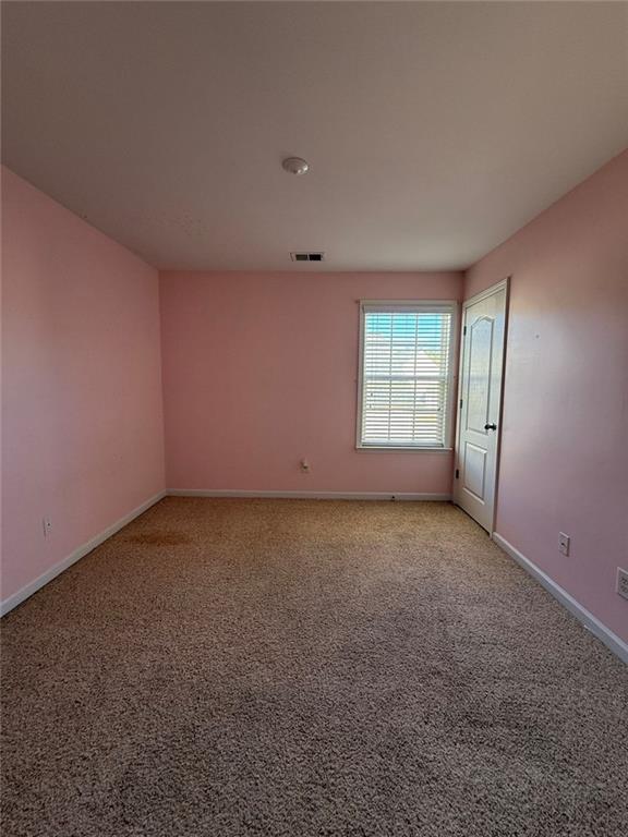 1009 South Creek Drive Villa Rica, GA 30180 - Photo 49 of 61 an empty room with a window