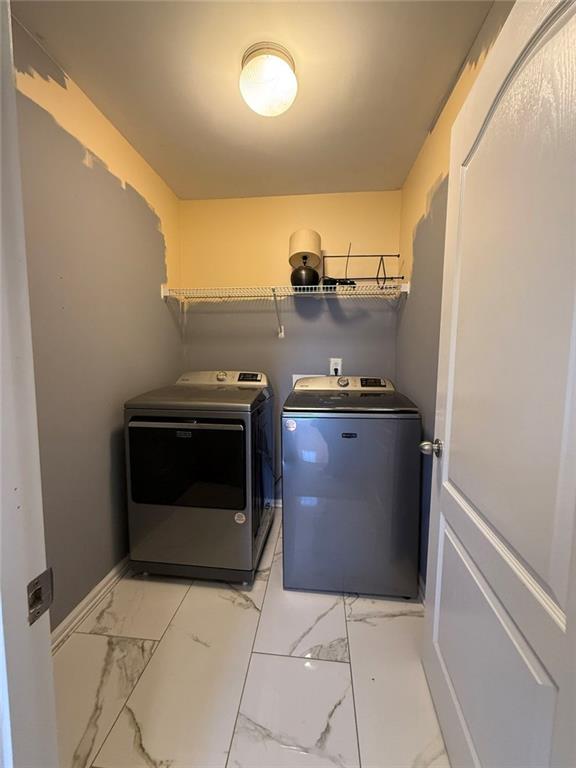 1009 South Creek Drive Villa Rica, GA 30180 - Photo 54 of 61 a kitchen with a stove and a microwave