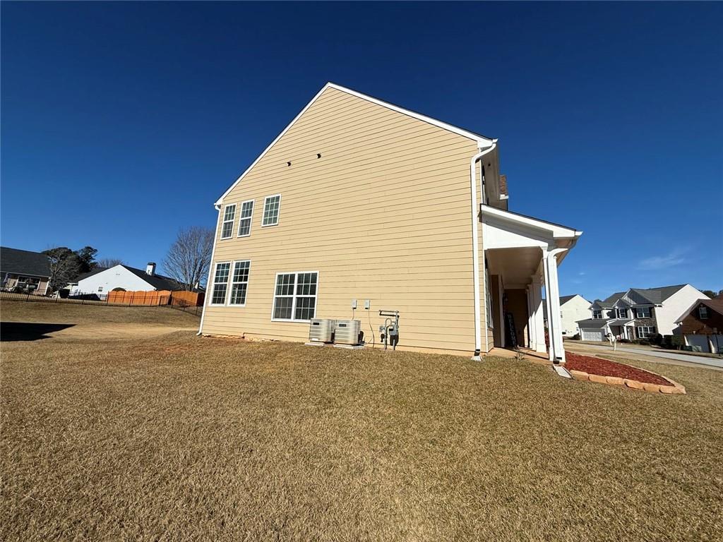 1009 South Creek Drive Villa Rica, GA 30180 - Photo 6 of 61 a large house with a outdoor space