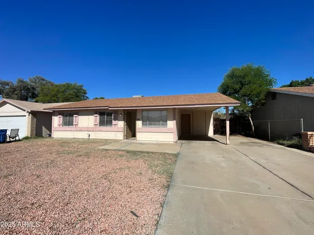 a front view of a house with yard