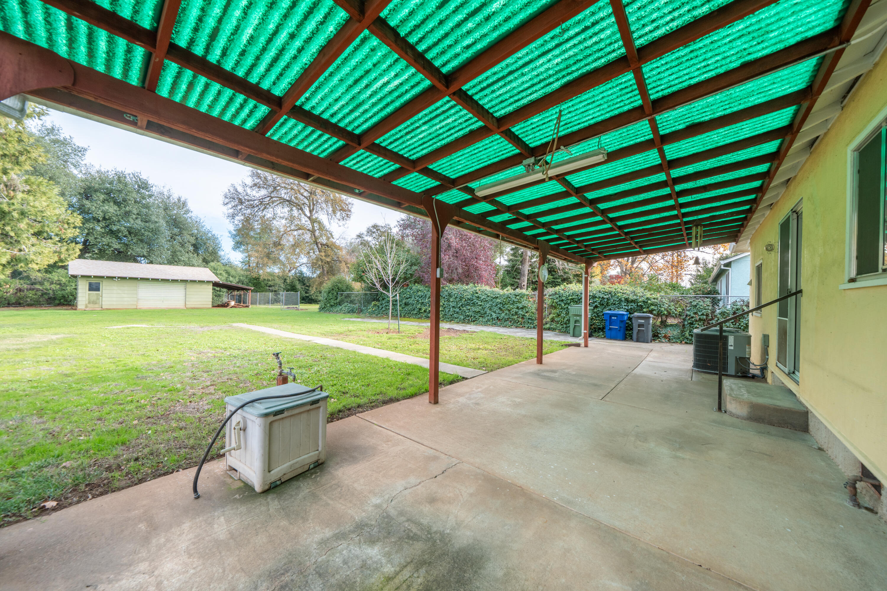 1209 C Street Redding, CA 96002 - Photo 35 of 48 a view of a house with backyard