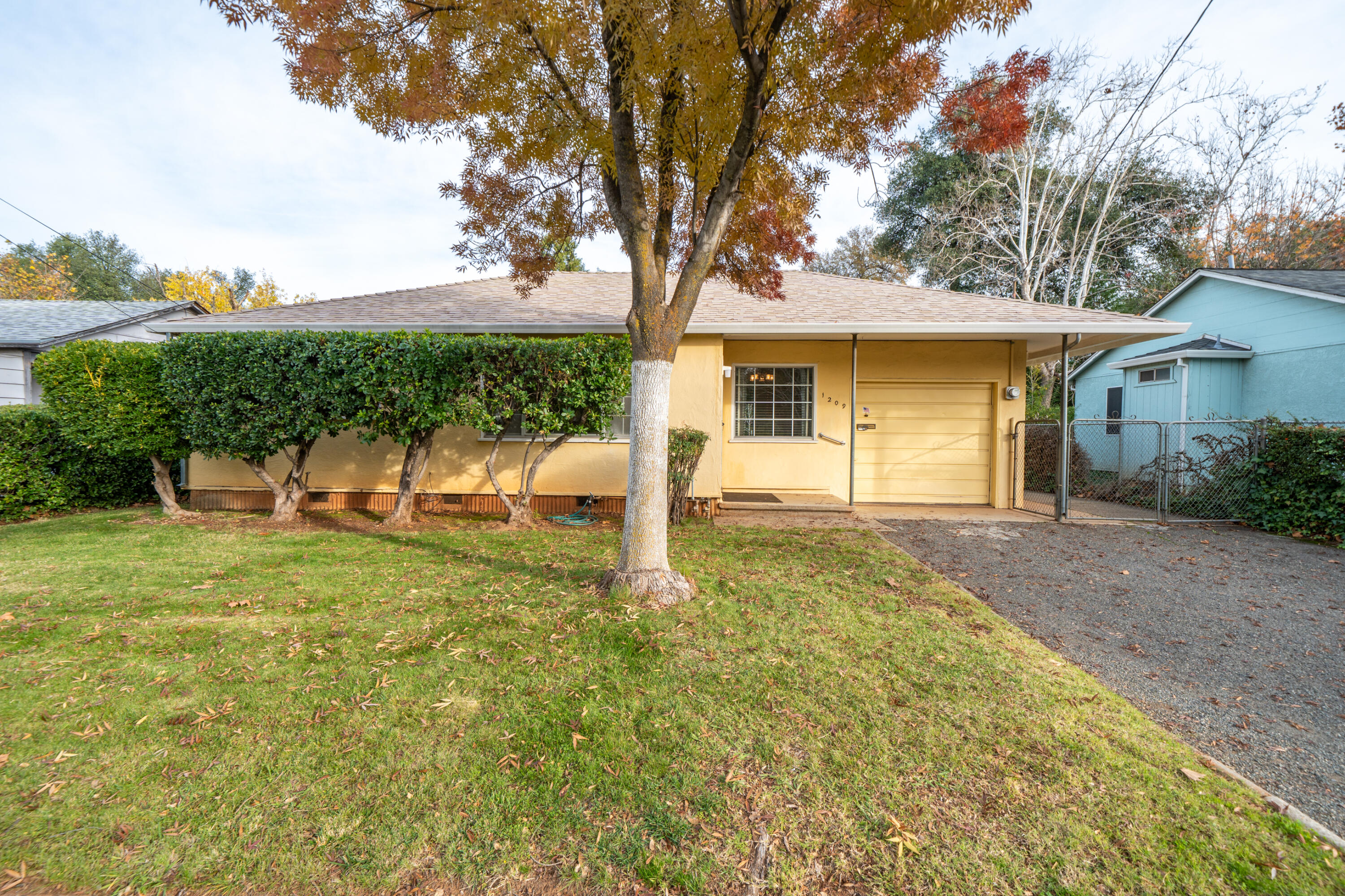 1209 C Street Redding, CA 96002 - Photo 44 of 48 a front view of a house with garden