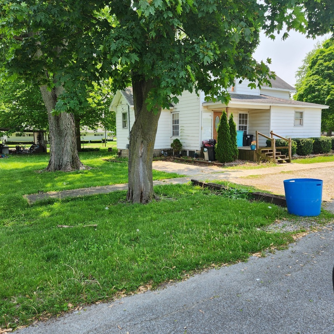 Undisclosed Address Sheldon, IL 60966 - Photo 4 of 24 a house view with a sitting space and garden