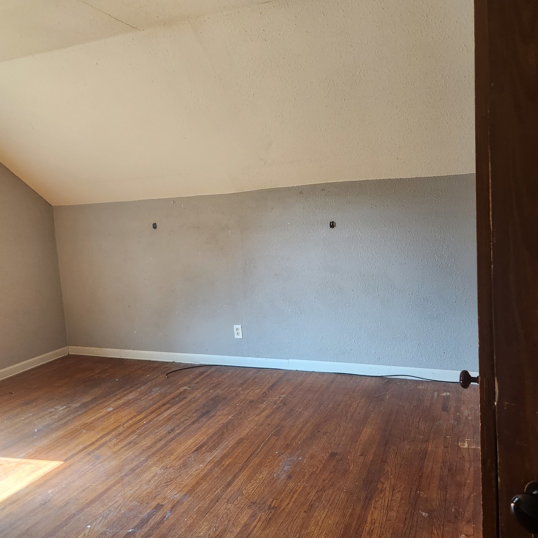 Undisclosed Address Sheldon, IL 60966 - Photo 8 of 24 an empty room with wooden floor