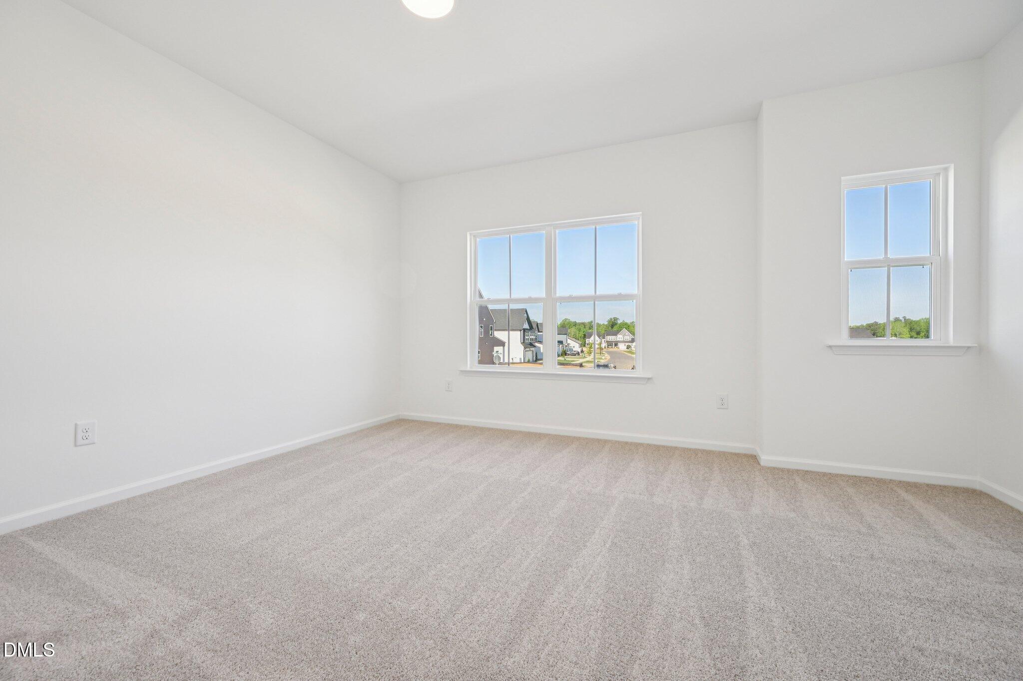 142 North Harvest Rdg Way, Unit HOMESITE 310 Clayton, NC 27520 - Photo 25 of 43 an empty room with a window