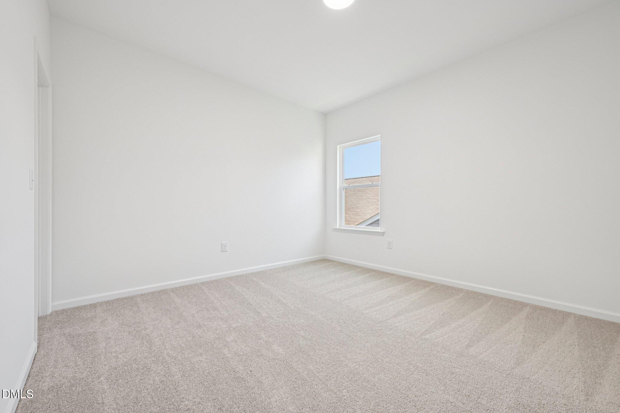 142 North Harvest Rdg Way, Unit HOMESITE 310 Clayton, NC 27520 - Photo 26 of 43 a view of an empty room and window