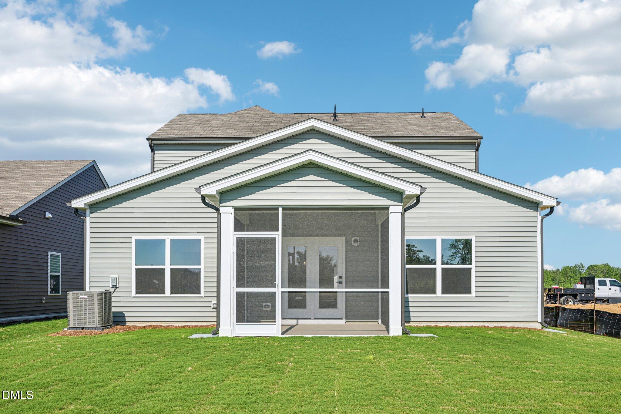 142 North Harvest Rdg Way, Unit HOMESITE 310 Clayton, NC 27520 - Photo 29 of 43 a house view with a garden space