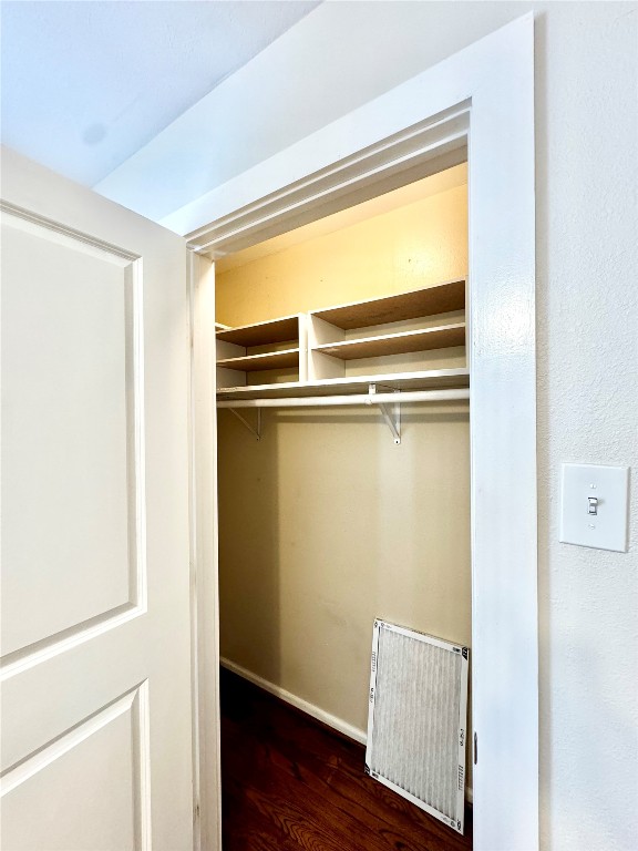 1035 Louise Street Houston, TX 77009 - Photo 13 of 28 a view of closet with wooden floor