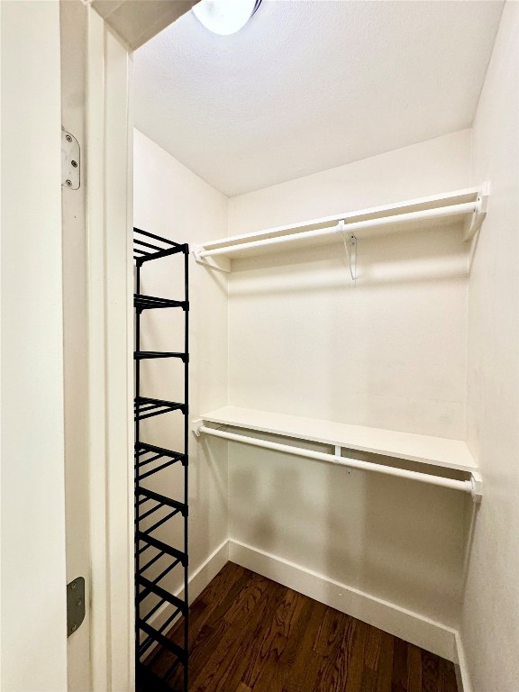 1035 Louise Street Houston, TX 77009 - Photo 16 of 28 a view of walk in closet with empty racks
