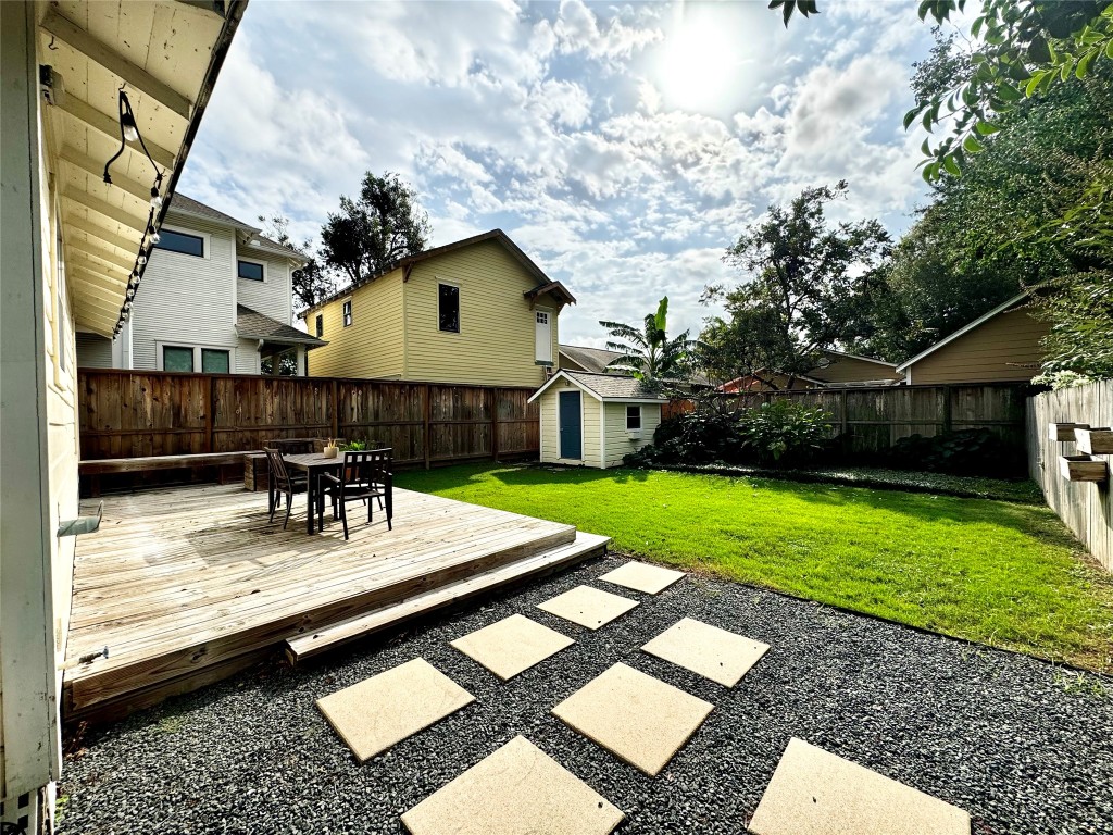 1035 Louise Street Houston, TX 77009 - Photo 22 of 28 a view of a house with backyard and sitting area