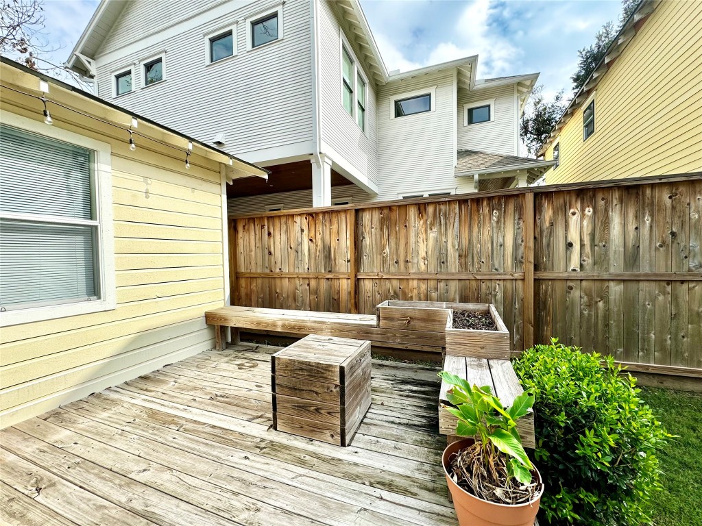 1035 Louise Street Houston, TX 77009 - Photo 24 of 28 a view of a patio with couches table and chairs and potted plants