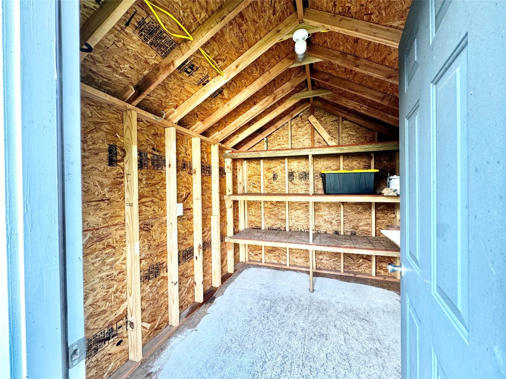 1035 Louise Street Houston, TX 77009 - Photo 27 of 28 a view of a room with wooden walls and windows
