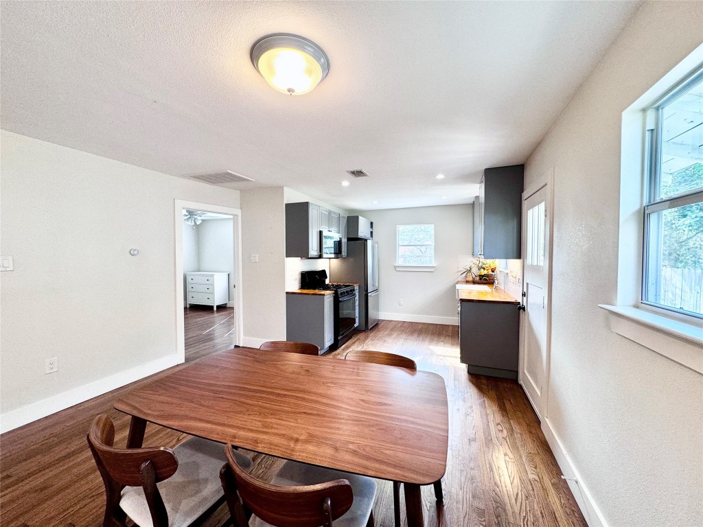 1035 Louise Street Houston, TX 77009 - Photo 7 of 28 a view of a dining room with furniture and window