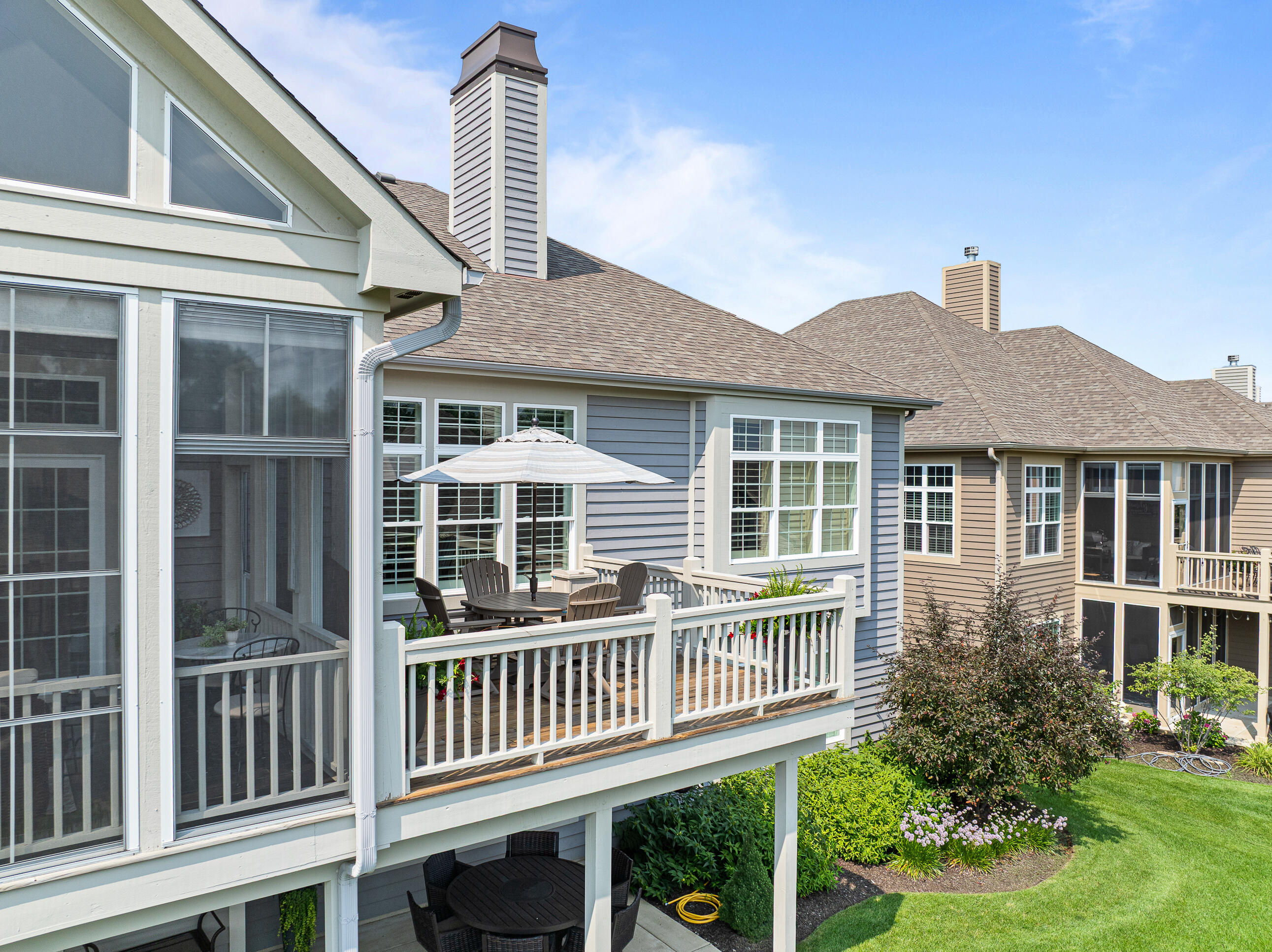 151 Lake Vista Circle, Unit 51 Fontana, WI 53125 - Photo 24 of 80 Rear elevation