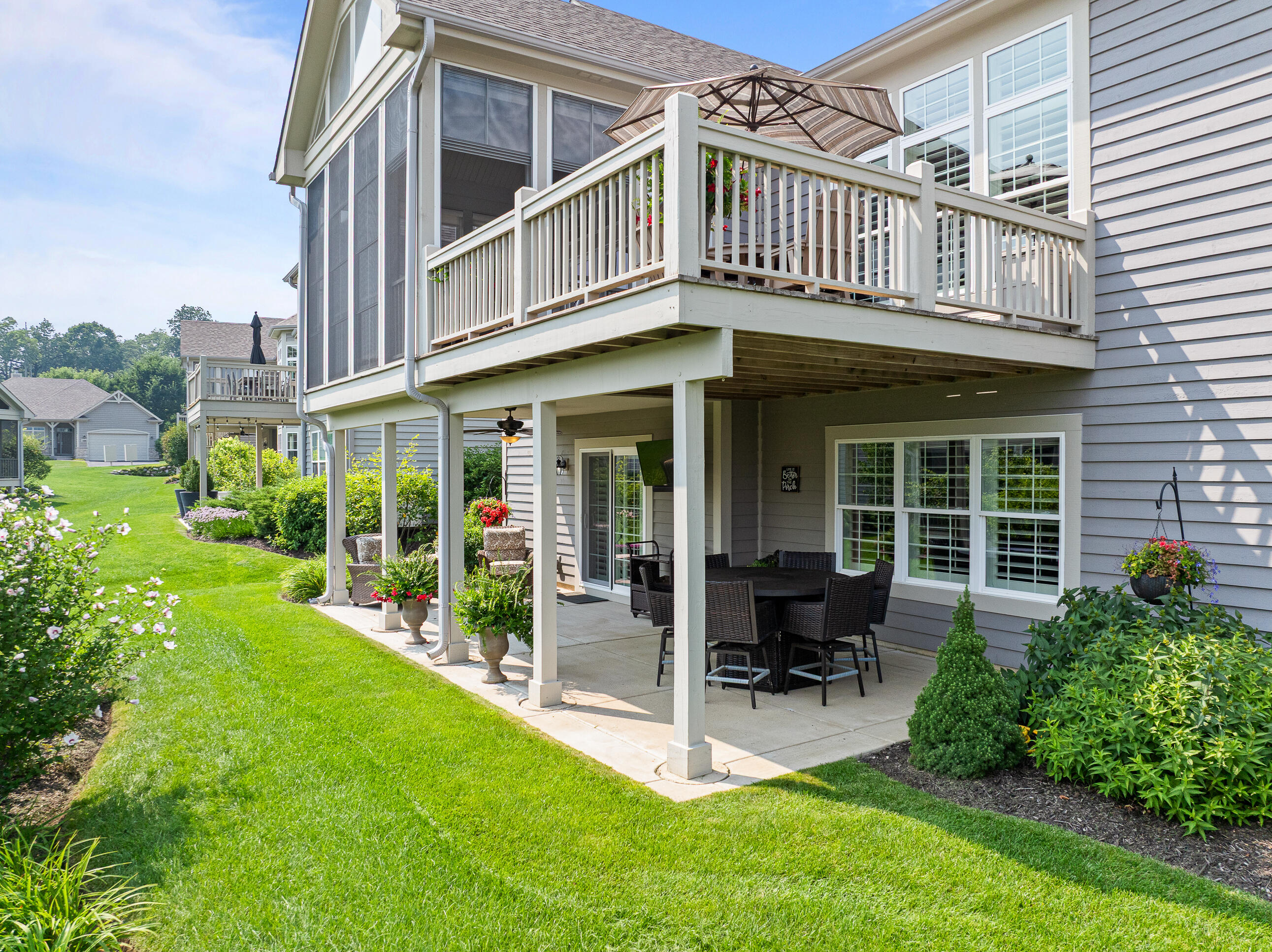 151 Lake Vista Circle, Unit 51 Fontana, WI 53125 - Photo 76 of 80 Close up of deck and patio