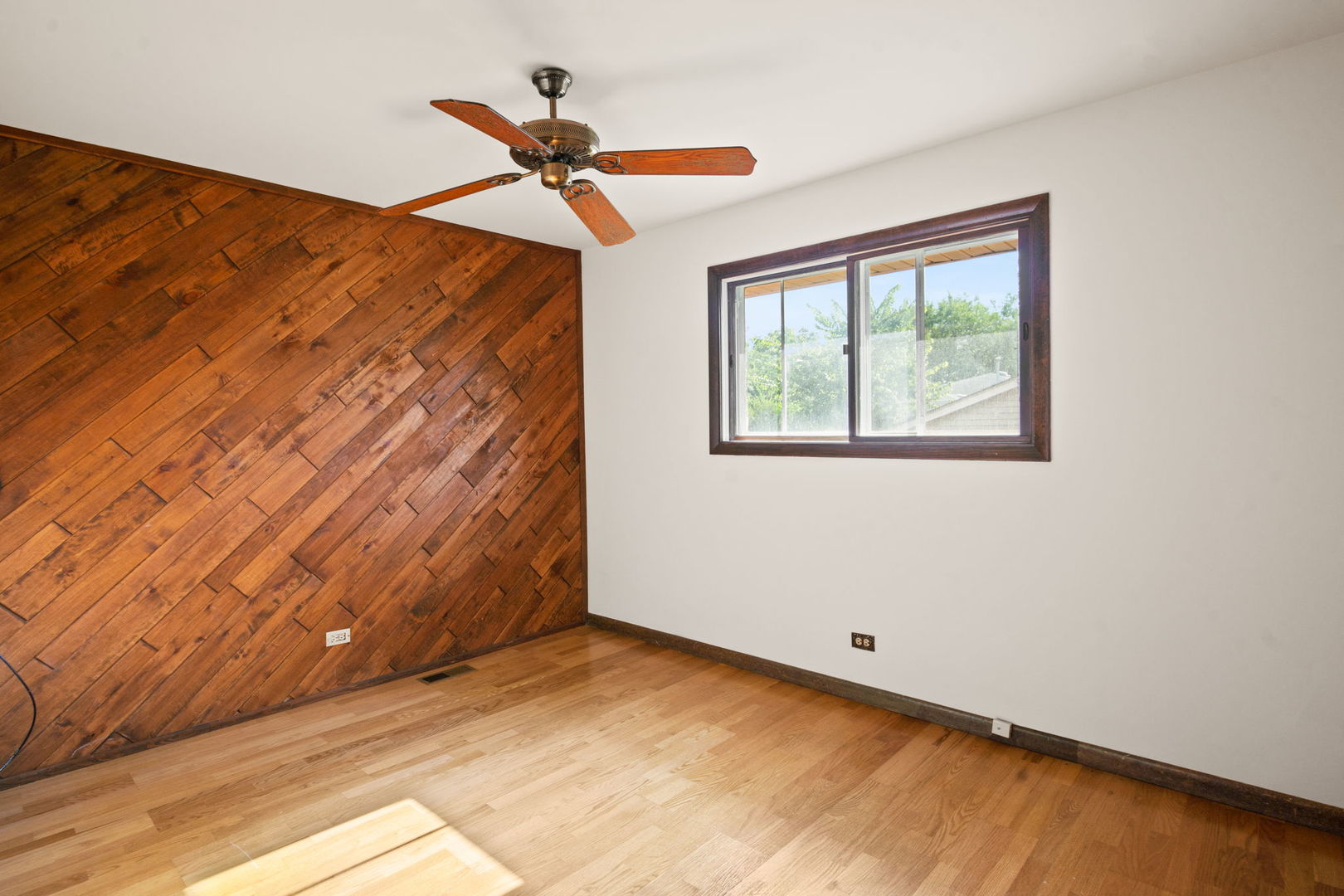 S064 Calvin Court Wheaton, IL 60187 - Photo 13 of 25 a view of an empty room with a window
