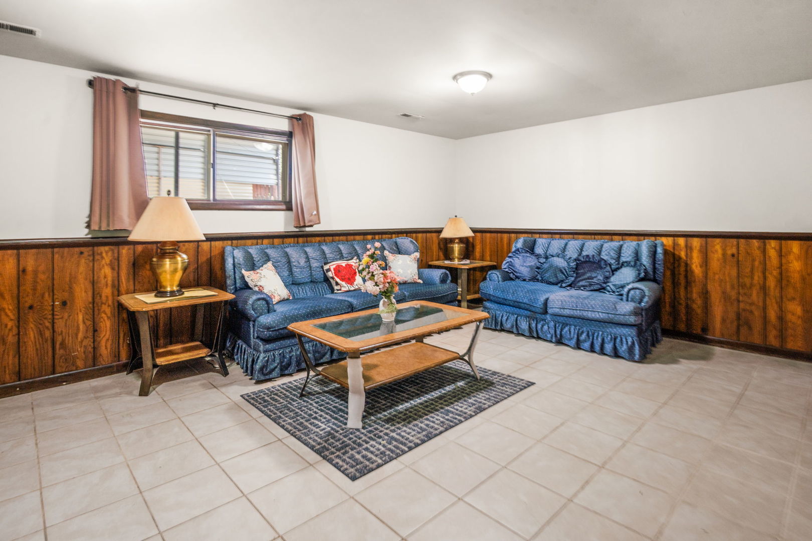 S064 Calvin Court Wheaton, IL 60187 - Photo 20 of 25 a living room with furniture and a window