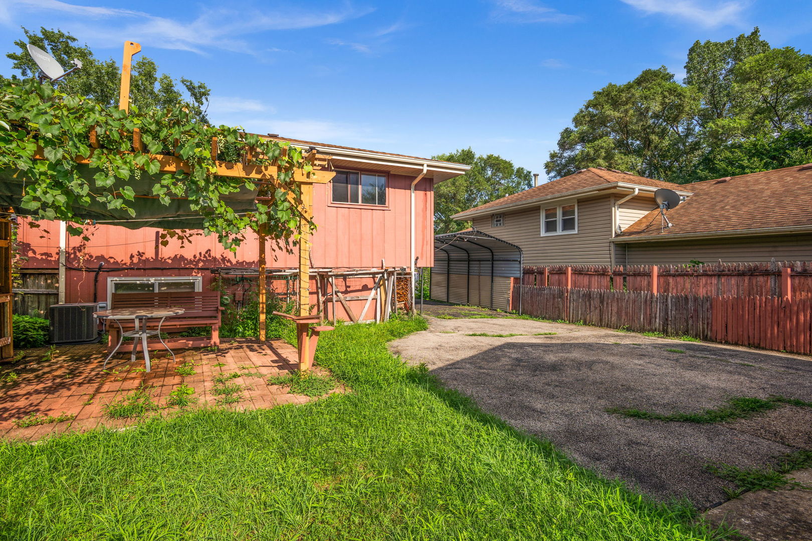S064 Calvin Court Wheaton, IL 60187 - Photo 24 of 25 a view of a backyard with a patio