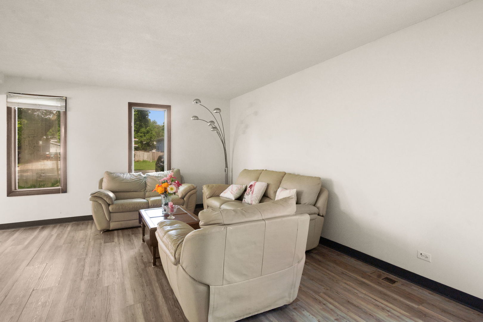 S064 Calvin Court Wheaton, IL 60187 - Photo 5 of 25 a living room with furniture and a window