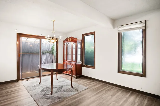 a view of a livingroom with furniture and window