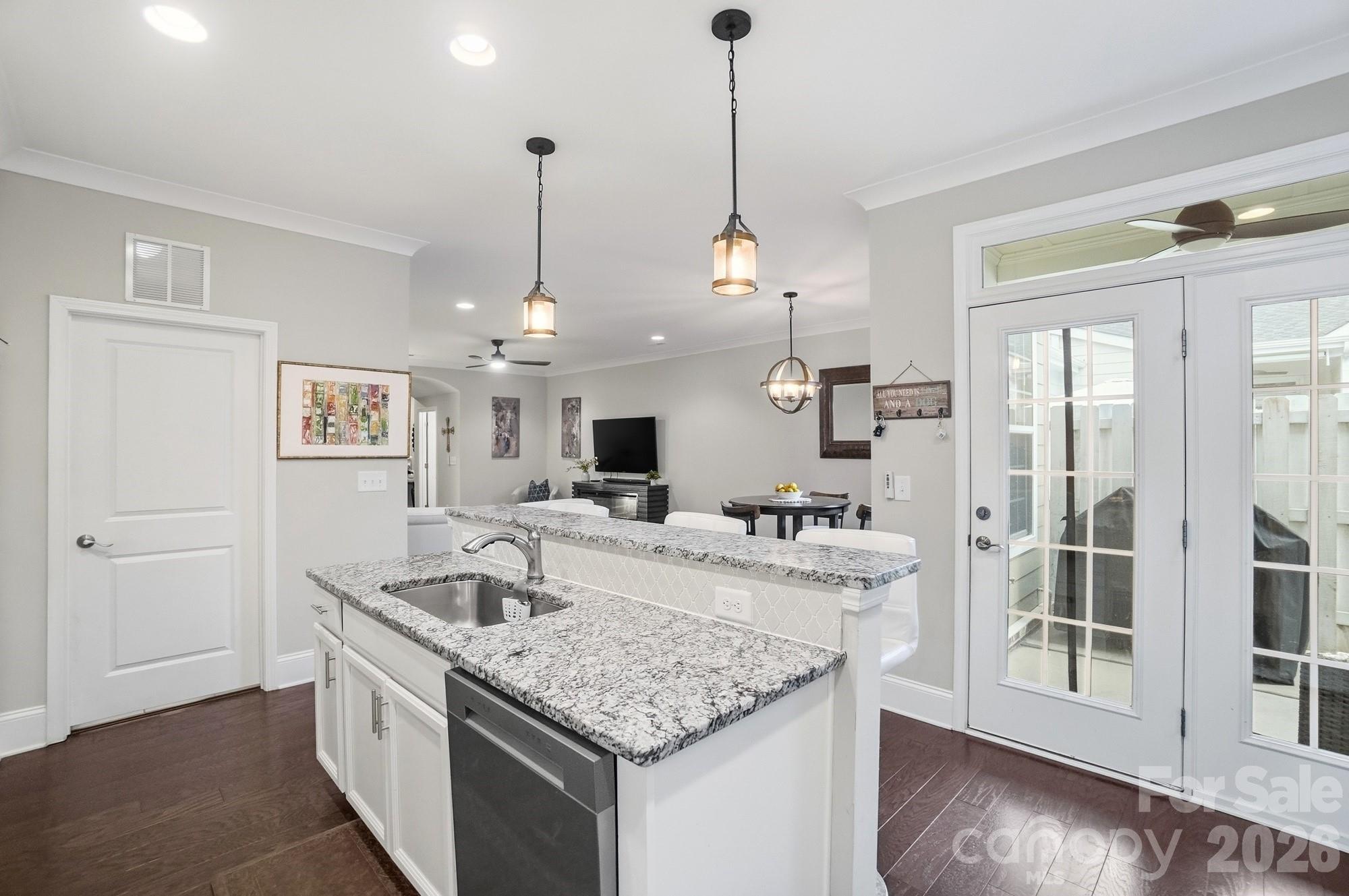 6270 Hove Road Mint Hill, NC 28227 - Photo 15 of 46 a kitchen with center island a sink appliances and a counter top space
