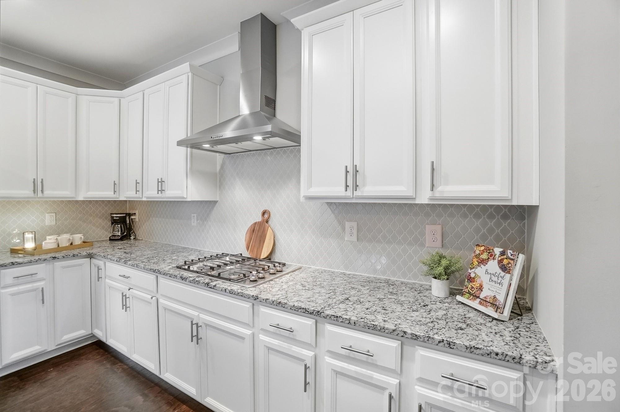 6270 Hove Road Mint Hill, NC 28227 - Photo 17 of 46 a kitchen with white cabinets and a sink