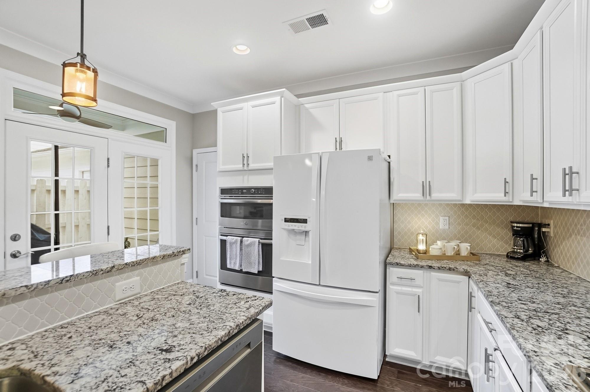 6270 Hove Road Mint Hill, NC 28227 - Photo 18 of 46 a kitchen with refrigerator and window