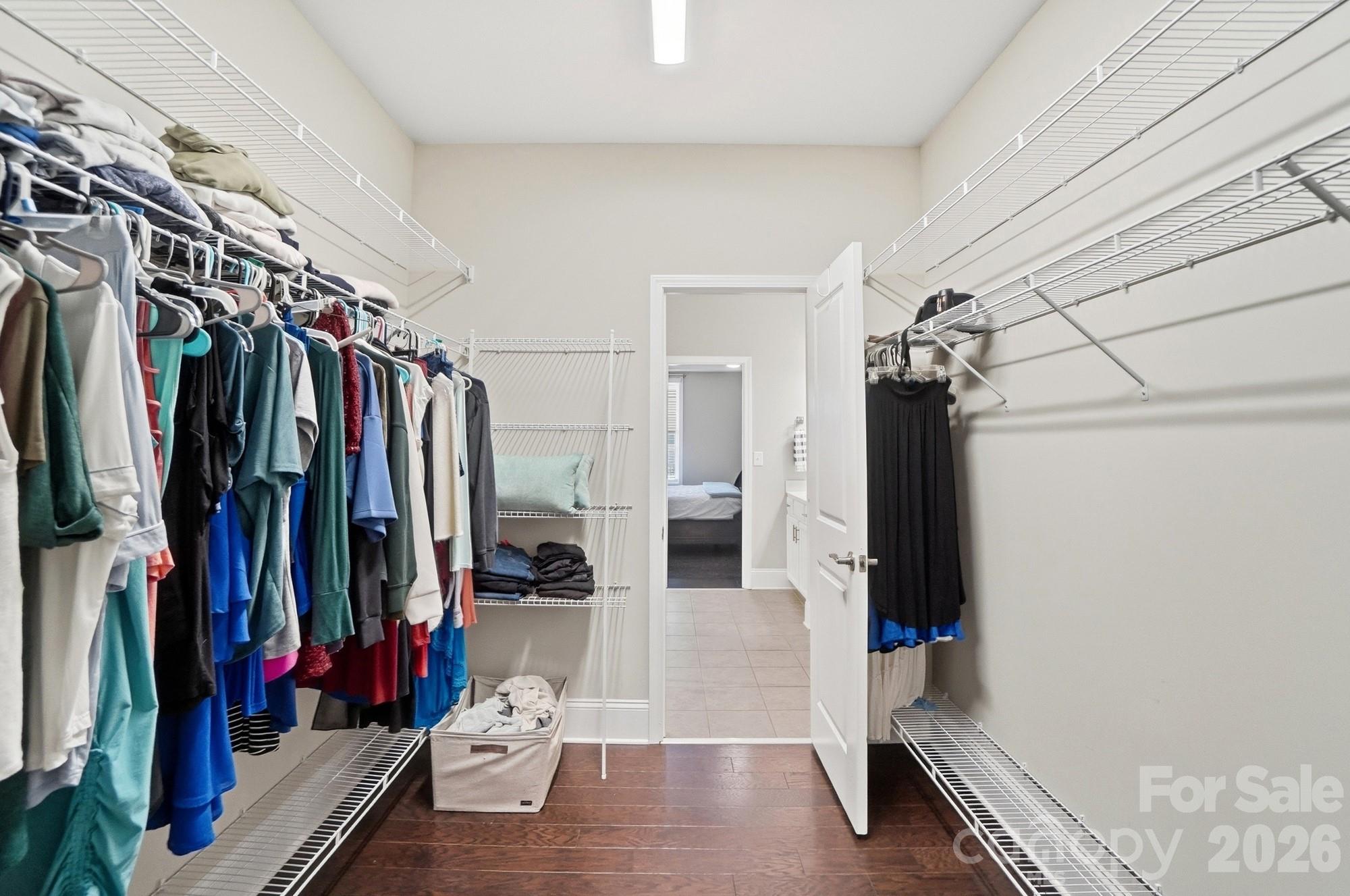 6270 Hove Road Mint Hill, NC 28227 - Photo 28 of 46 a view of walk in closet with clothes and shoes